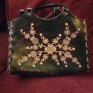 Brown leather embossed hand bag